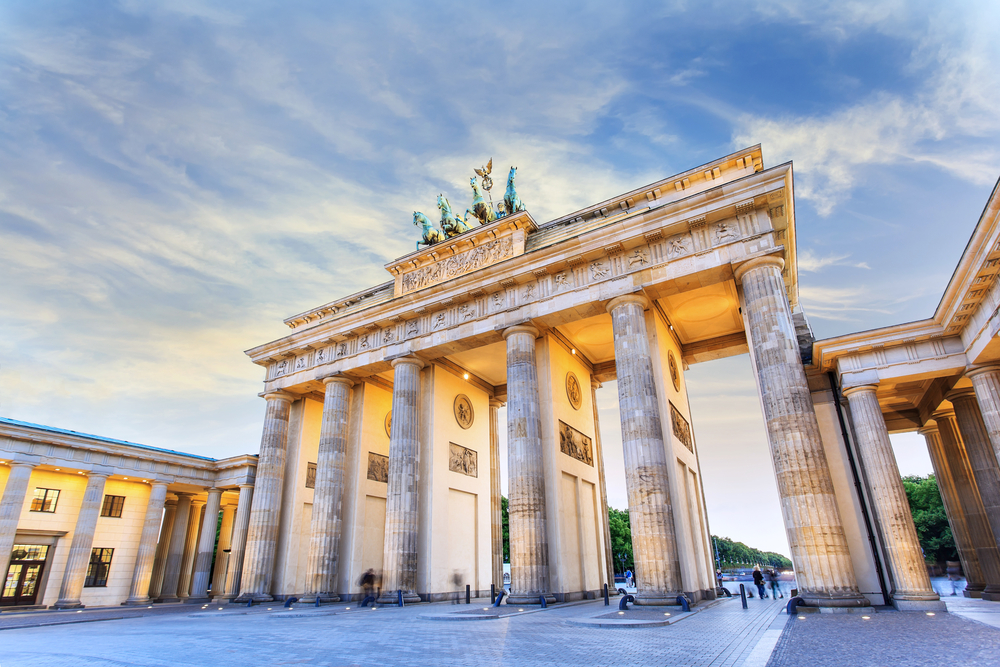 An African American traveler exploring Berlin, Germany's rich history and multicultural landmarks, exemplifying black travel in Europe - Black Travel